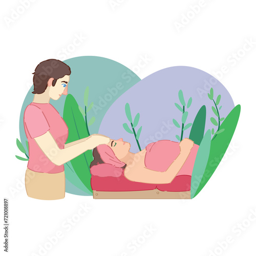 Woman receiving face massage in spa salon