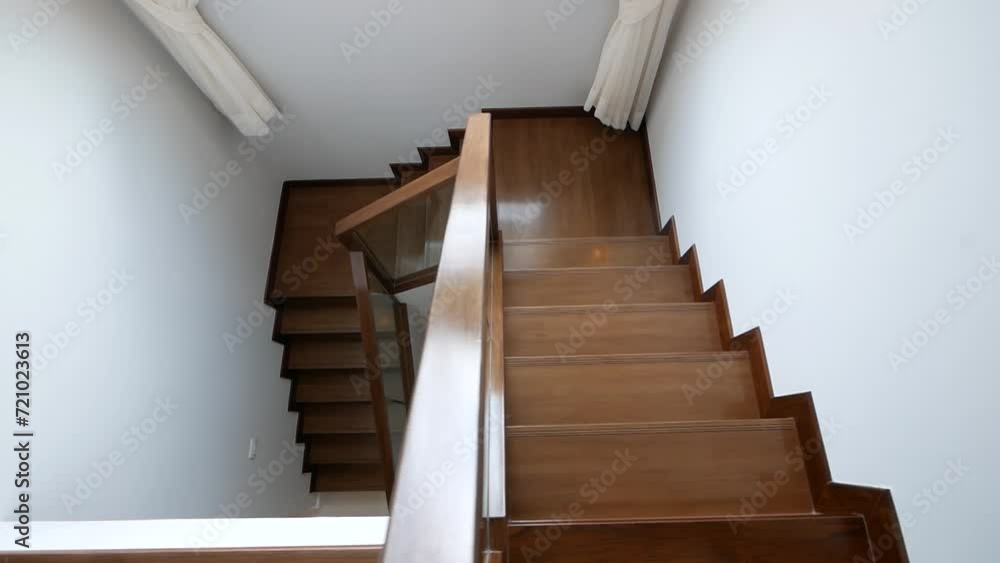 Nice and Clean Shiny Wooden Stairway and White Wall Nice and Clean Shiny Wooden Stairway and White Wall