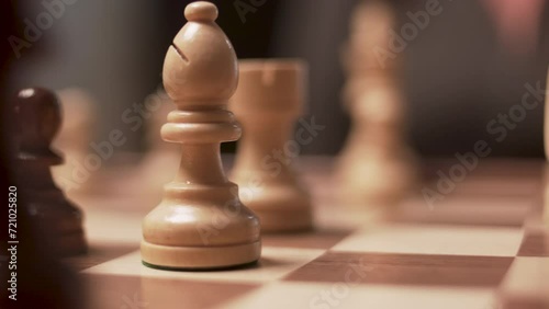 Detail of chessboard pieces during a game photo