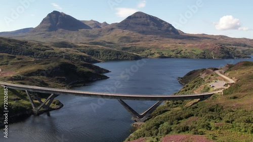 Drone footage of Kylesku Bridge crossing the Loch a' Chairn Bhain in Sutherland, Scotland, UK photo