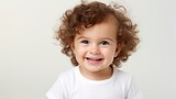 Portrait of a cheerful little girl with curly hair on a gray background Generative AI