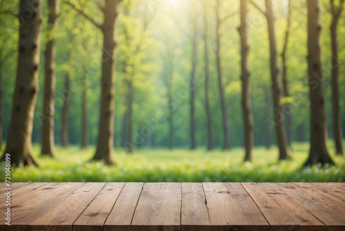 Wooden table in forest, blurred morning forest background