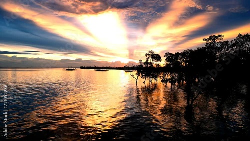 Aerial view of sunset on the coastline, Kaimana, West Papua, Indonesia