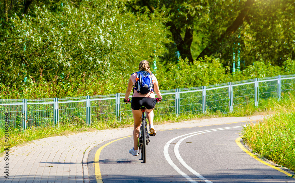 Cyclist ride on the bike path in the city Park Cyclist ride on the bike path in the city Park