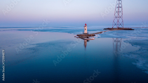 View from above. Winter Vladivostok. Tokarevsky lighthouse at dawn. photo