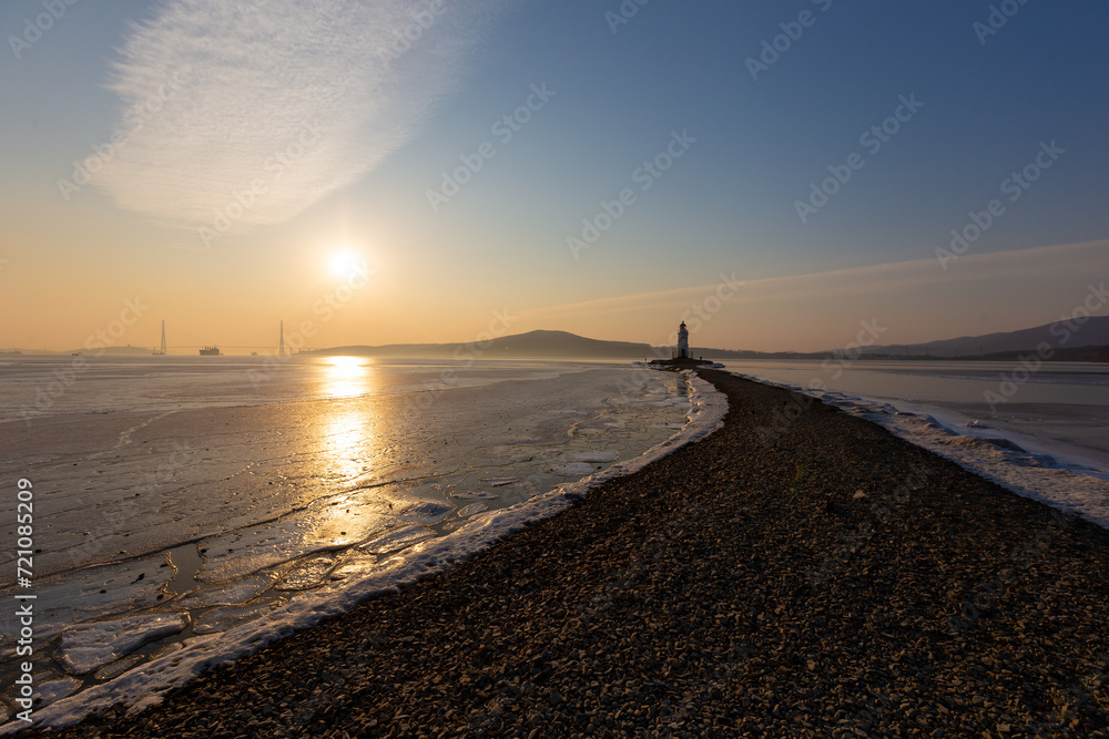 Winter Vladivostok. Tokarevsky lighthouse at dawn.