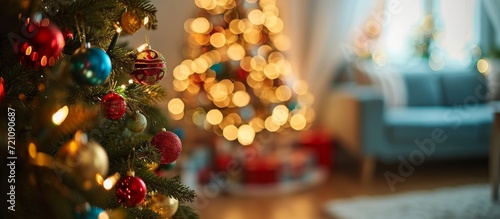 Vibrant Christmas Tree in a Defocused Living Room Background Creates a Festive Holiday Ambiance: Defocused Background, Living Room, Christmas Tree