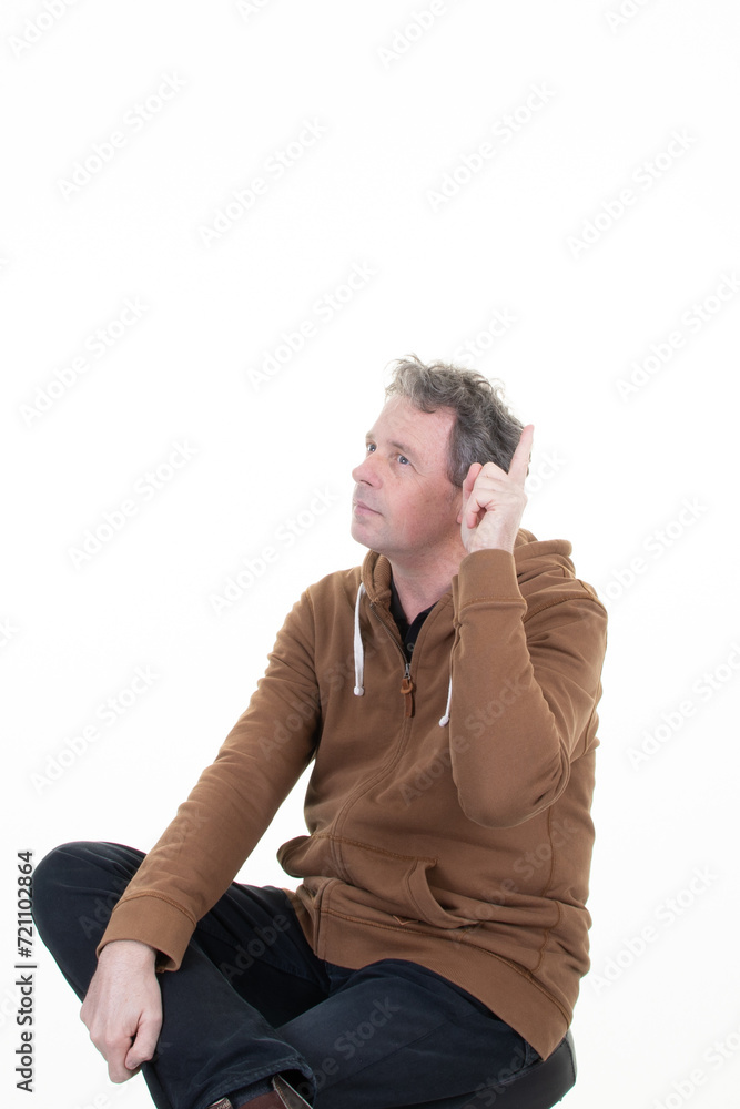 finger up hand man middle aged handsome sit in hoodie over white background finger up hand man middle aged handsome sit in hoodie over white background