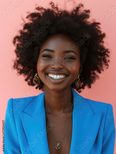 Young Afro smiling woman with blue suit, photo models