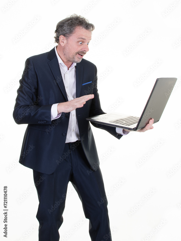 Excited business man middle aged in suit feeling shocked amazed surprised winner with wow face expression celebrating unbelievable winning on white background Excited business man middle aged in suit feeling shocked amazed surprised winner with wow face expression celebrating unbelievable winning on white background