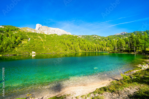 Steirersee on the high plateau of the Tauplitzalm. View of the lake at the Toten Gebirge in Styria. Idyllic landscape with mountains and a lake on the Tauplitz in Austria.
 photo