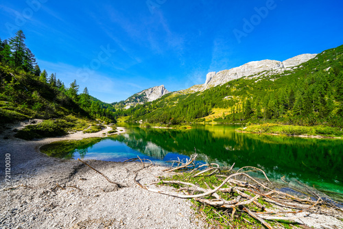 Steirersee on the high plateau of the Tauplitzalm. View of the lake at the Toten Gebirge in Styria. Idyllic landscape with mountains and a lake on the Tauplitz in Austria.
 photo