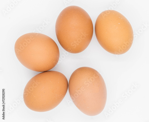 Fresh Chicken Eggs on white background.
