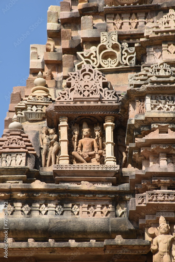 This is photo of temple at Khajuraho in India. It is example of finest art in the world. 