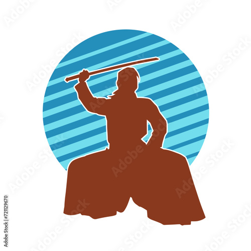 Silhouette of a sword warrior in action pose. Silhouette of a martial art person carrying sword weapon. Silhouette of kendo martial art pose.