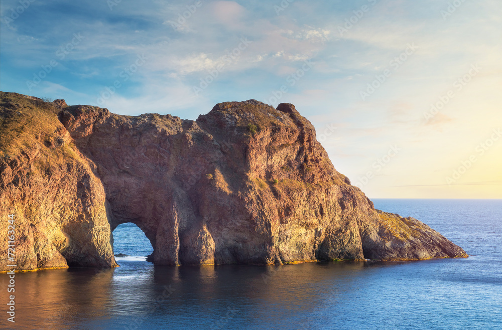 Beautiful grotto on the sea during the sunse