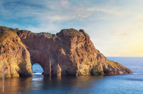 Beautiful grotto on the sea during the sunse