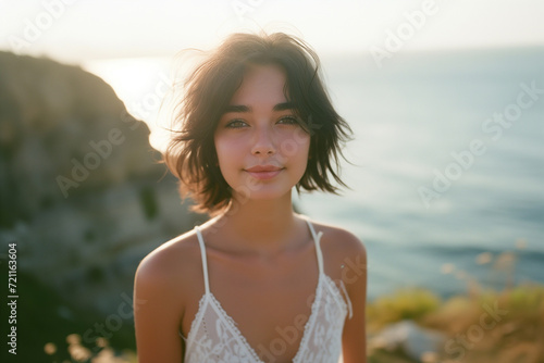 portrait of a beautiful girl, in warm colors, with rays of sun
