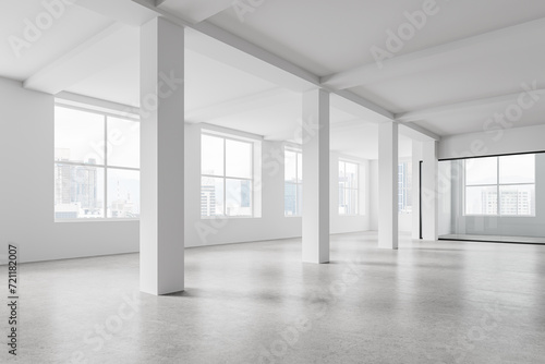 Stylish empty office interior and columns, panoramic window on skyscrapers