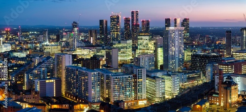 Aerial image of Manchester cityscape at dusk showing new urban developments