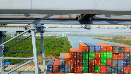 Lazaro Cardenas, Mexico - 18.03.2023 Container ship has loading operations with few gantry cranes in Lazaro Cardenas Container Terminal during the the day time. photo