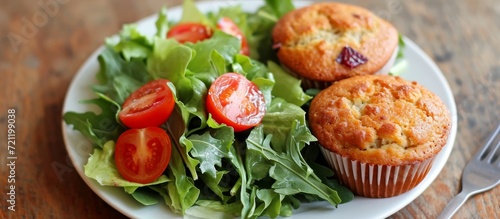 Deliciously Fresh Salad and Muffin Combo: A Refreshing Twist with Fresh Salad Greens, Tantalizing Salad Dressing, and Scrumptious Homemade Muffins