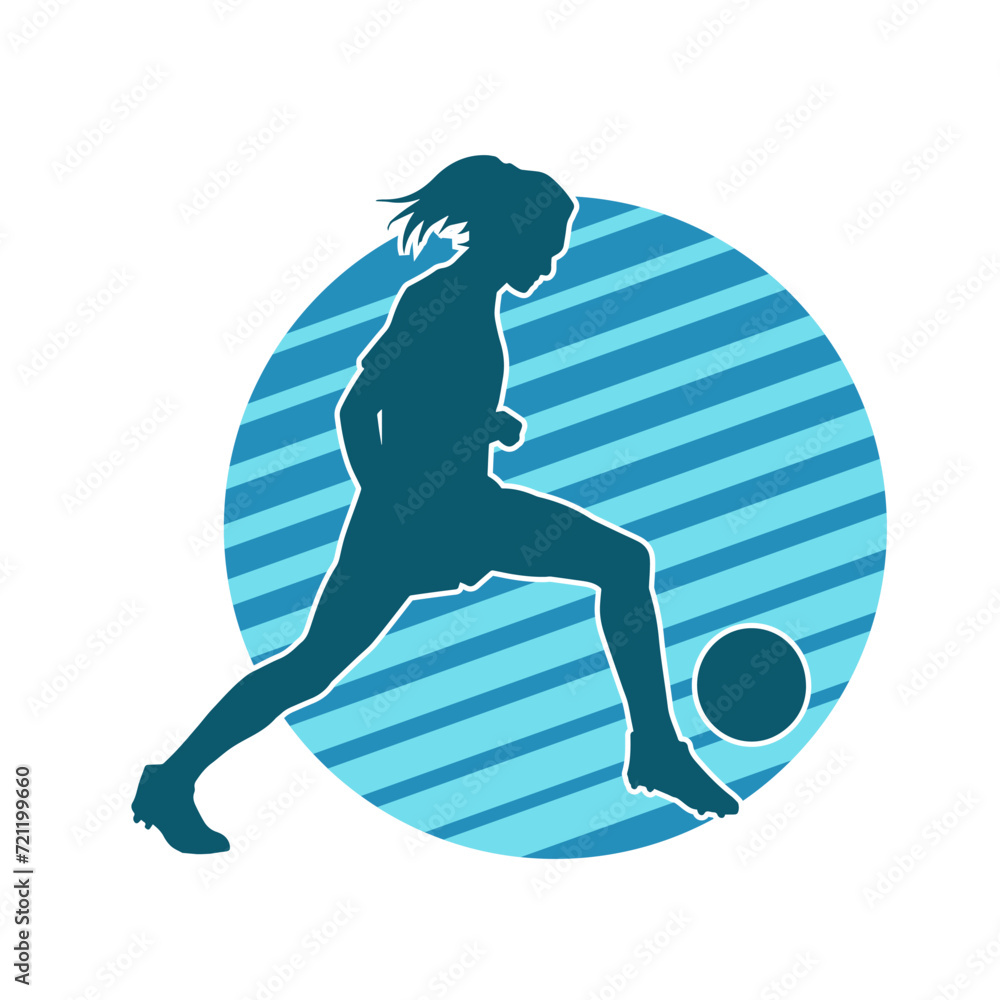 Silhouette of a female soccer player kicking a ball. Silhouette of a football player woman in action pose.