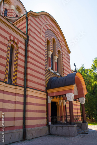 The landmark Holy Trinity Orthodox Church in Banja Luka, Republika Srpska, Bosnia and Herzegovina. Built Serbian Byzantine style between 1962 and 1972 of red and yellow travertine stone #721199829