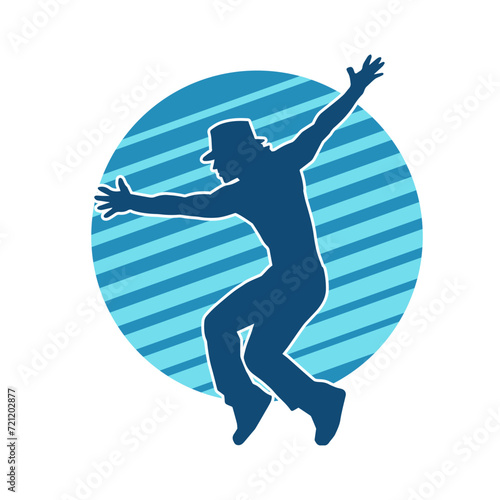 Silhouette of a slim man dancing pose. Silhouette of a male dancer in action pose.