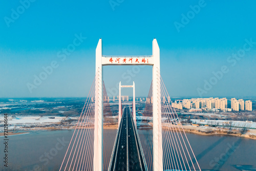 Qihe Yellow River Bridge in Dezhou, Shandong Province in winter photo