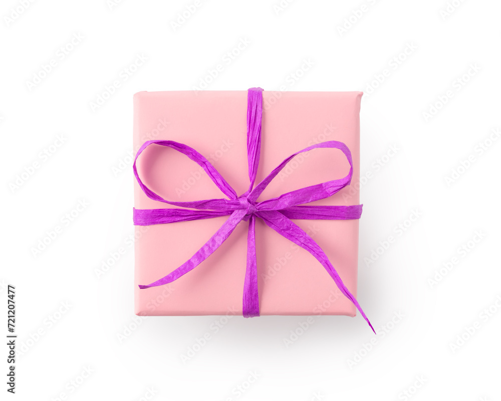 Top view of paper pink color present box with purple recycled paper ribbon isolated on white