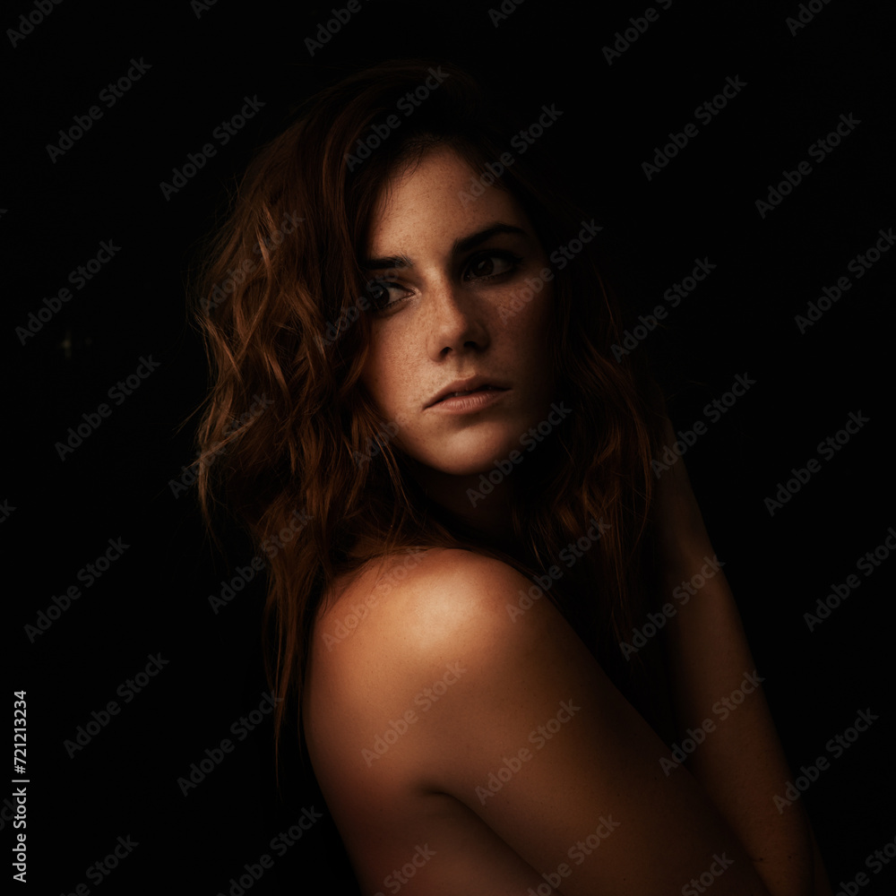 Woman thinking, body and skincare in studio for cosmetics, dermatology and shadow or light for art deco and aesthetic. Beauty model or person with self care and sensual on a dark or black background