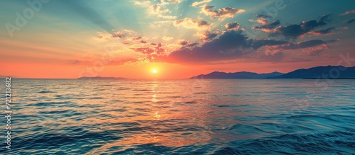 Tranquil sunset sunrise sky  calm sea  panoramic beach landscape  tropical waves  peaceful Mediterranean view.
