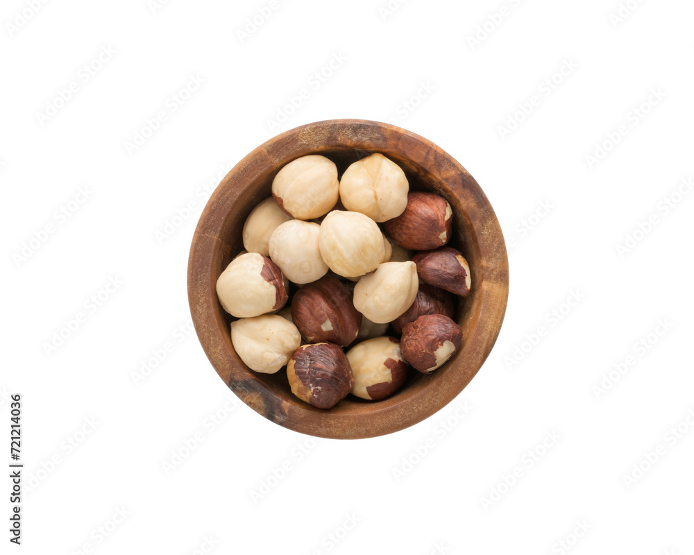 Top view of peeled hazelnuts in a wood bowl isolated on white background Top view of peeled hazelnuts in a wood bowl isolated on white background
