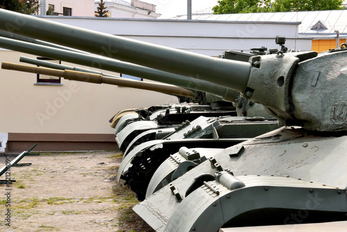 Tank company stands in the parking lot 