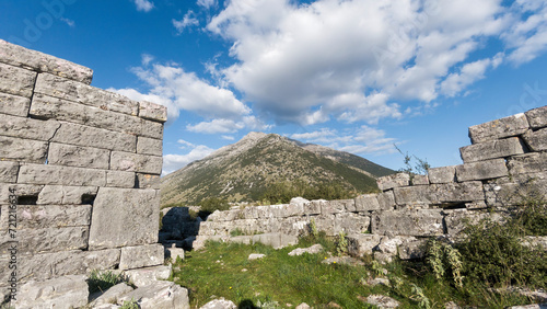 The ancient city of Orraon (or Horreum) in Greece, Europe. It was built by the Molossians in Epirus region during 1st c BC, using huge megalithic pieces of stone. Many ancient houses still stand! photo