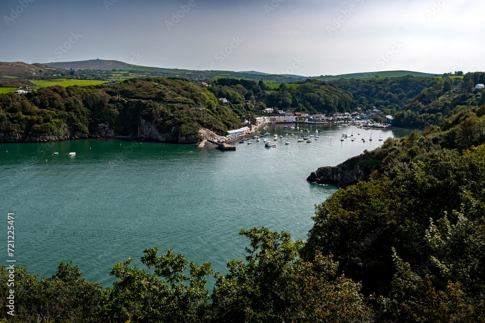 Old Harbor With Boats In The Village Fishguard At The Atlantic Coast Of Pembrokeshire In Wales, United Kingdom