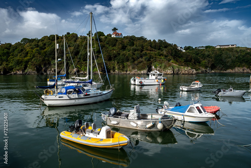 Old Harbor With Boats In The Village Fishguard At The Atlantic Coast Of Pembrokeshire In Wales, United Kingdom photo