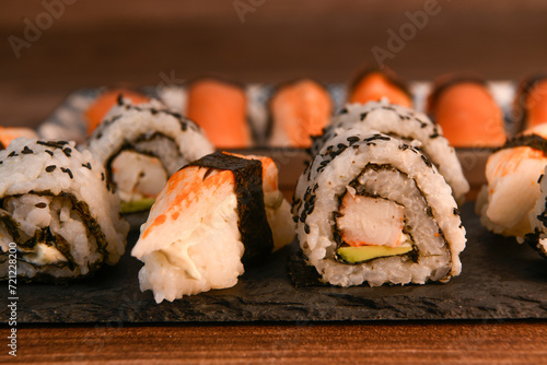 japanese sushi food. Maki ands rolls with tuna, salmon, shrimp, crab and avocado, High quality photo