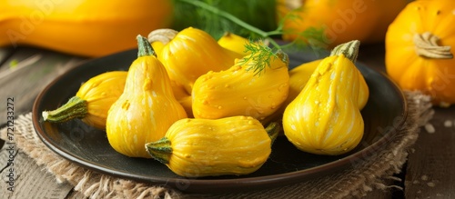 Fresh Yellow Squashes Arranged Beautifully on a Plate: A Refreshing Burst of Freshness with Vibrant Yellow Squashes on a Plate