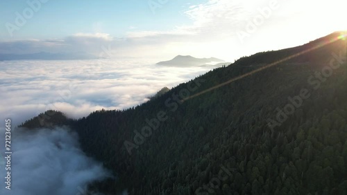 Flight above the clouds in the mountains of Georgia