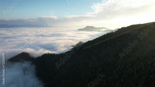 Flight above the clouds in the mountains of Georgia