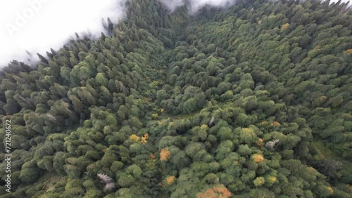 Flight above the clouds in the mountains of Georgia