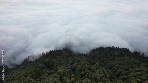 Flight above the clouds in the mountains of Georgia