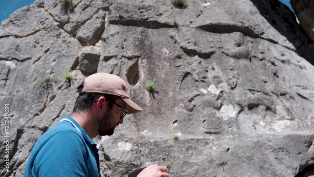 An archaeologist conducts research using modern methods in Yazilikaya in Hattusa, ancient capital of the Hittite Civilization - Corum, Turkey