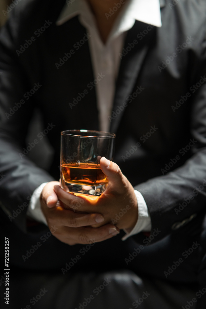 Businessmen in suits drinking Celebrate whiskey Businessmen in suits drinking Celebrate whiskey
