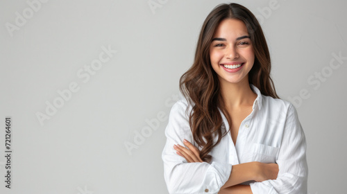 Smiling happy woman with arms crossed