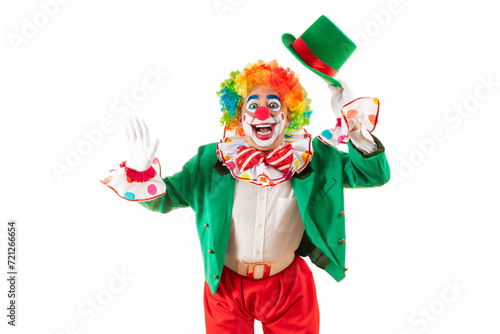 Funny clown. Entertainer Joker in colorful suit and wig. Buffoon with clown whiteface makeup. Trickster, jester, pantomime, mime. Professional actor at event, kids party, circus