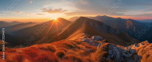 Sunrise overr autumn mountain panorama. Scenic fall landscape. Wide-angle view capturing the beauty of mountains in the autumn season, perfect for evoking the tranquility and colors of fall.
