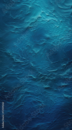 Blue abstract background with waves. Texture of water . photo
